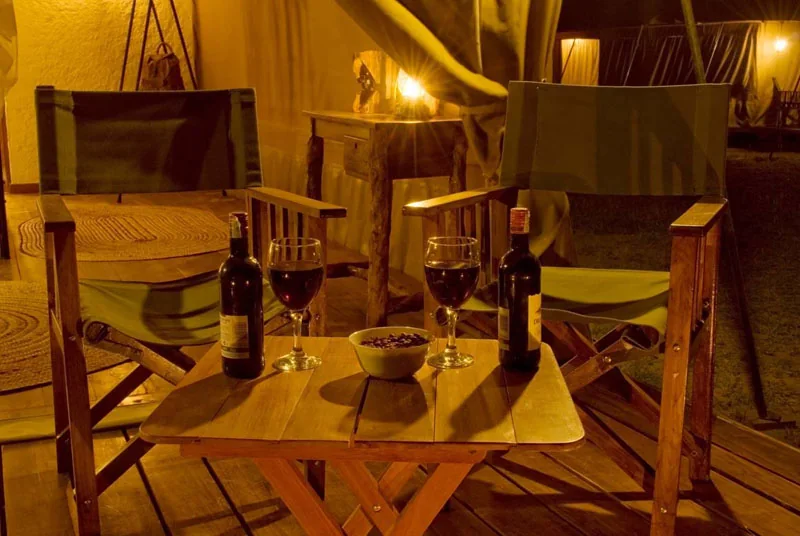 A private dinner laid inside a canvas tent